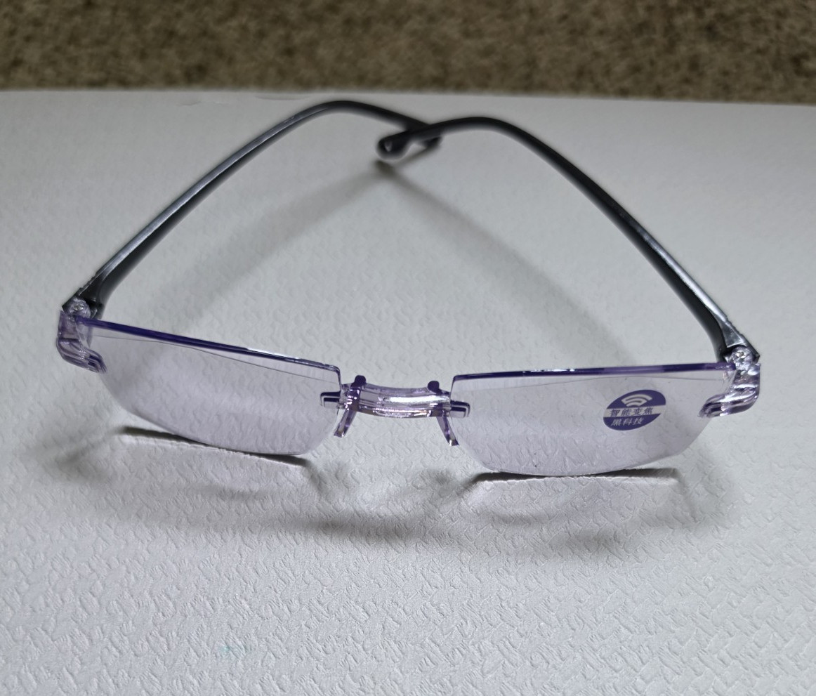 Rimless Purple Metal/Plastic Eyeglass Frames Unisex Adults Solid Pattern