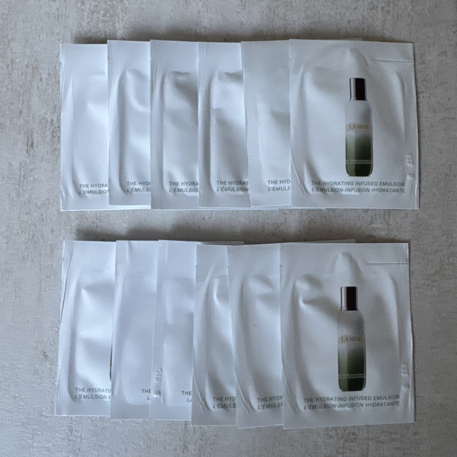 12x La Mer Hydrating Infused Emulsion Sample Travel Size 1.5mL 0.05oz Each