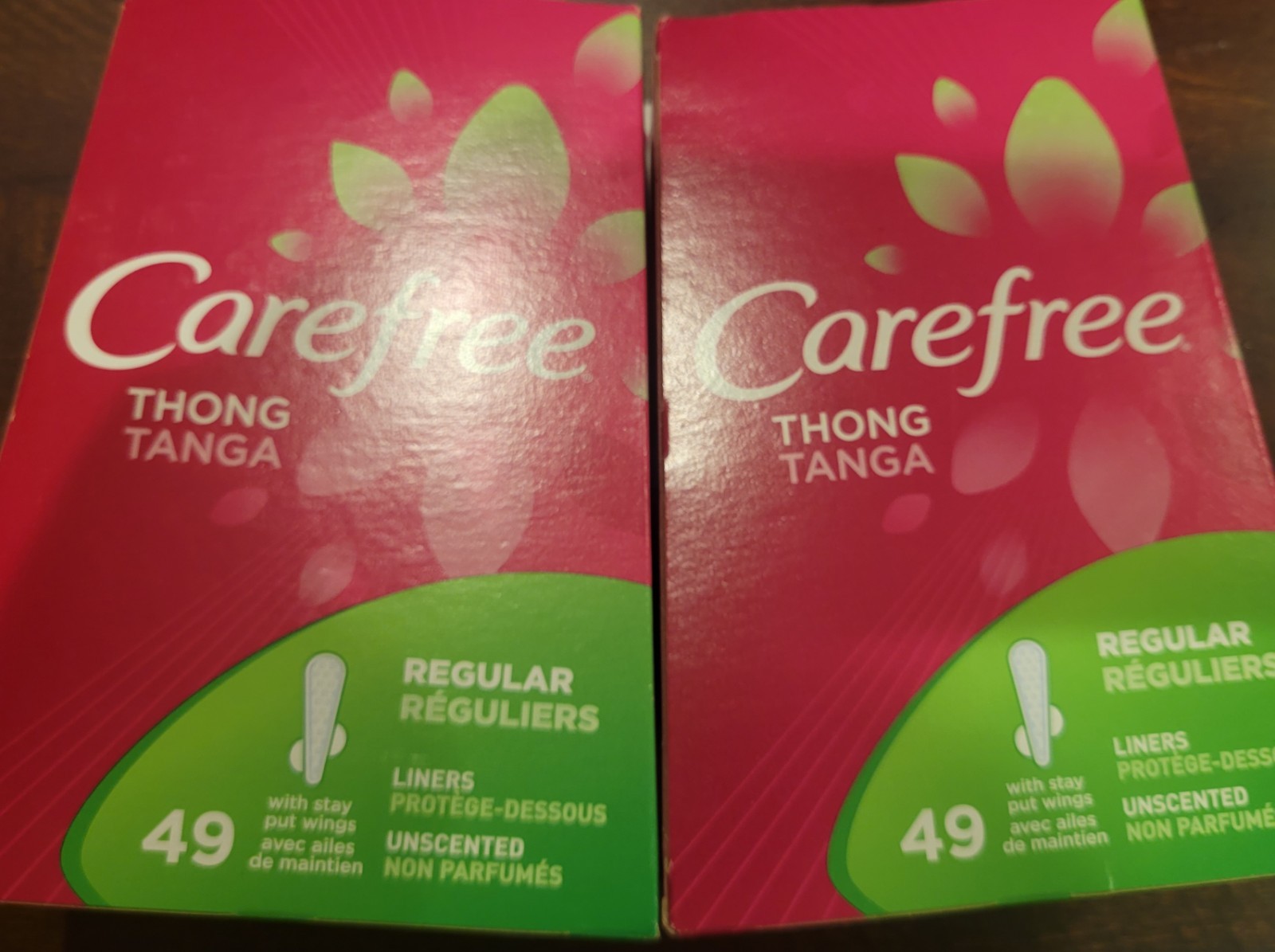 2 pkts Carefree THONG REGULAR LINERS With stay put wings 49 count each