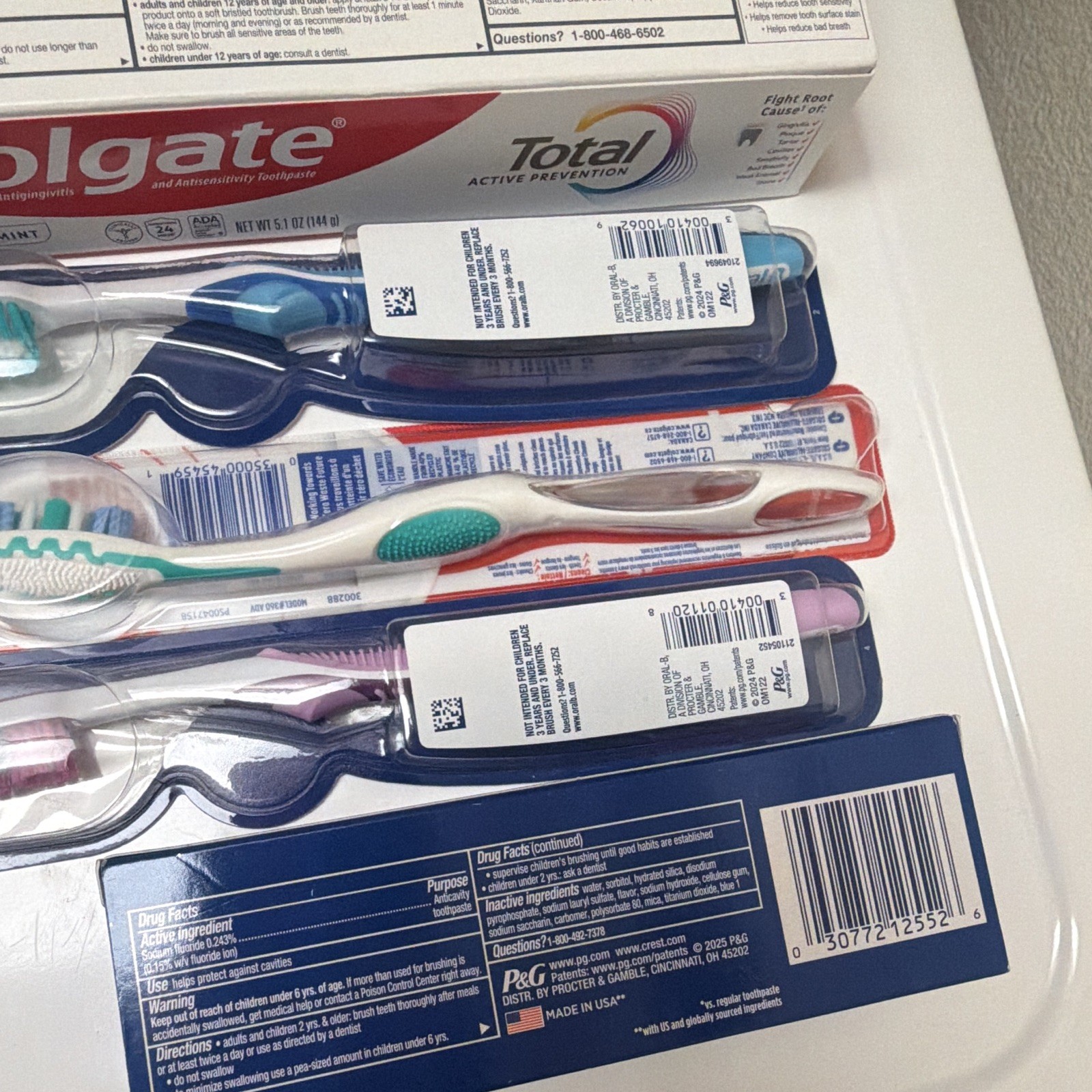 Colgate Total Clean Mint & Crest 3D White Arctic Fresh + Oral-B Toothbrush Lot