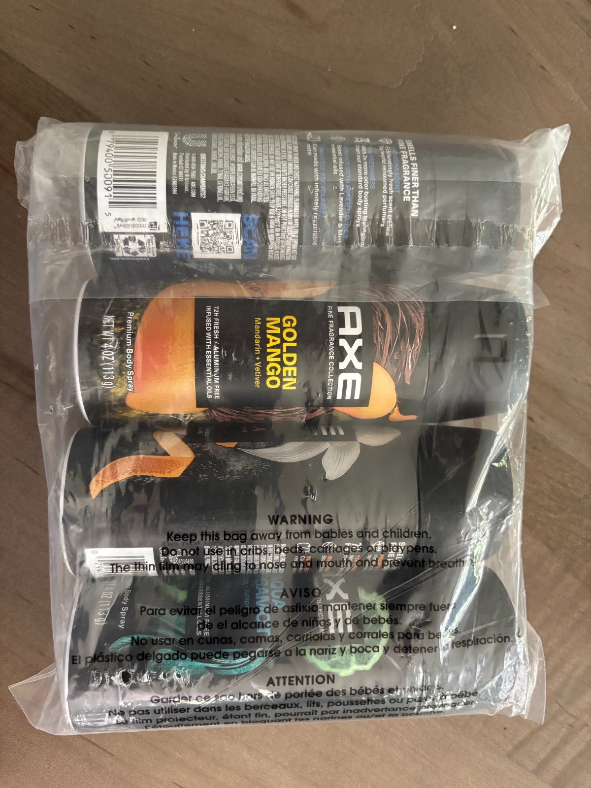 AXE body spray w/ aqua bergamot, gold mango, blue lavender, black vanilla scents