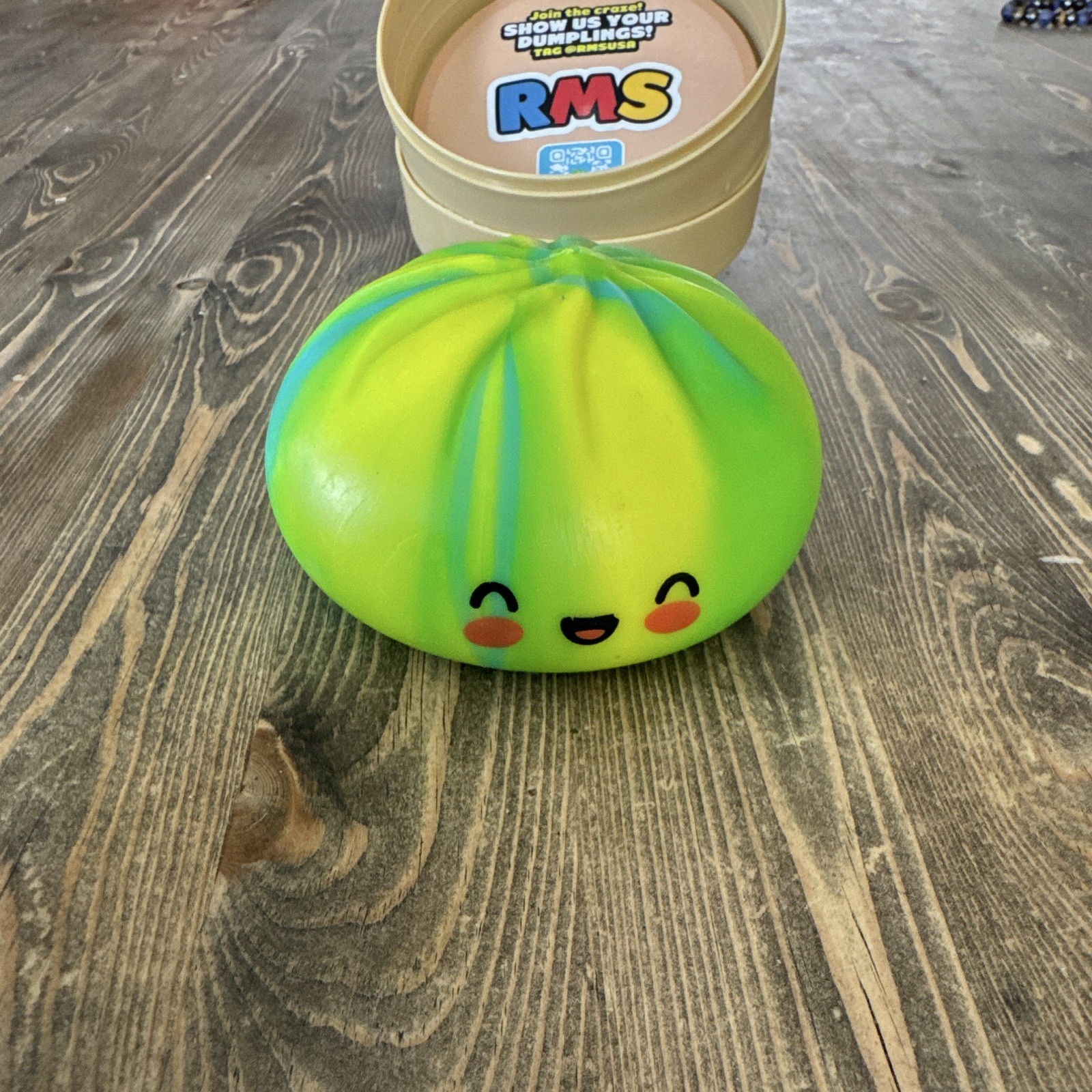 RMS Rare Dumpling Foam Squeeze Ball Squishy in Steamer Basket Green Yellow Blue