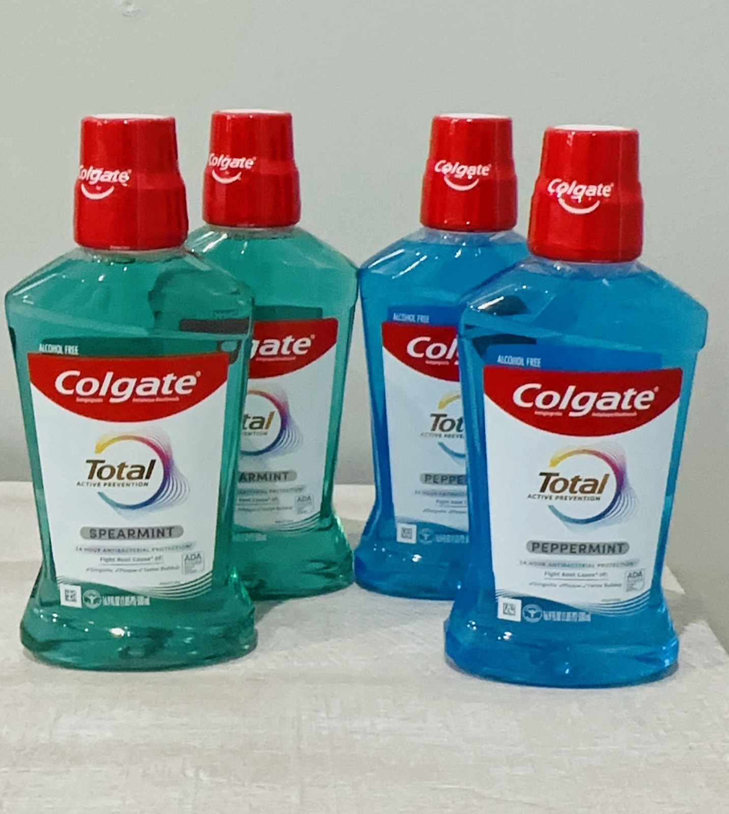 Colgate Total Mouthwash Alcohol-Free, Peppermint, 16.9 Oz, Pack of 4 Mix Pack