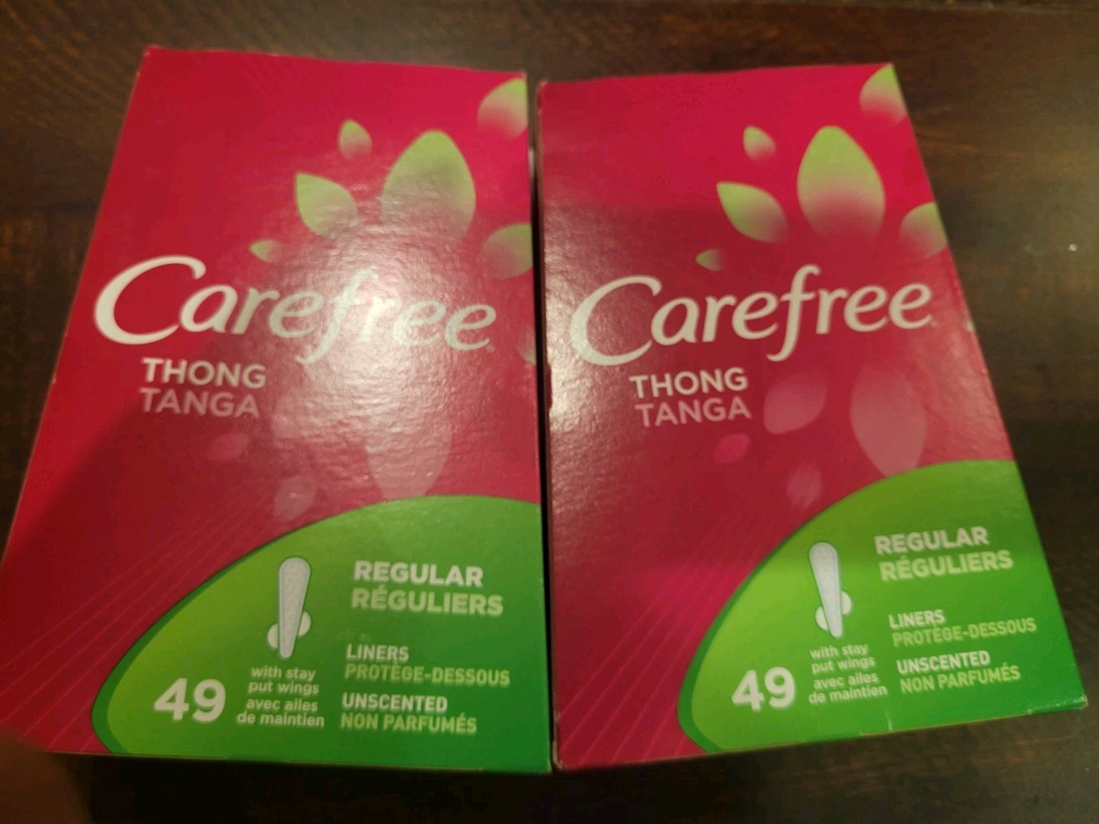 2 pkts Carefree THONG REGULAR LINERS With stay put wings 49 count each