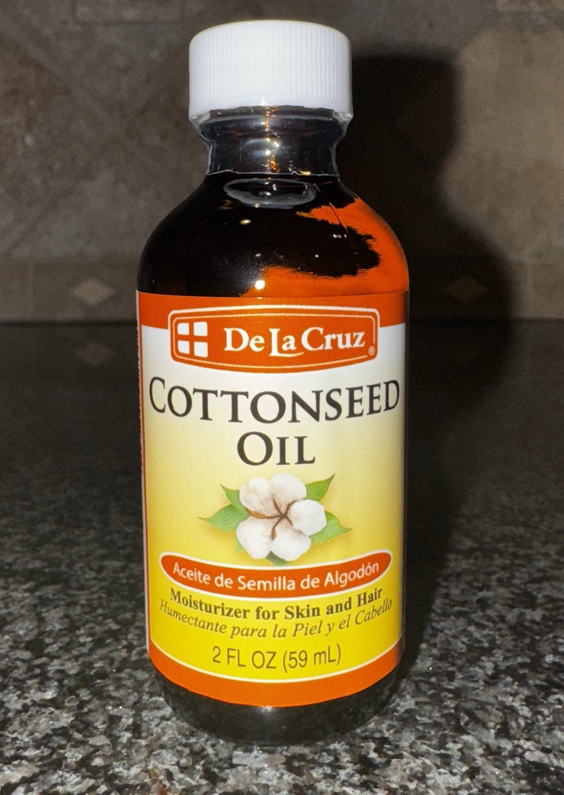 De La Cruz® Cottonseed Oil, from American Cotton, bottled in USA. 2 FL. OZ.