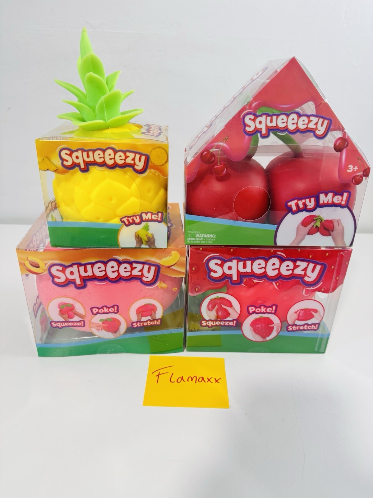 Sunny Days Squeezy Squishy Toys 4 Pack LOT Strawberry Peach Cherries Pineapple
