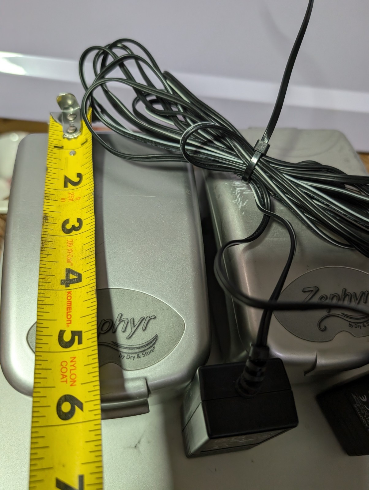Two Zephyr by Dry & Store, an electronic dehumidifier